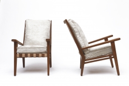 Jacques Adnet's armchair front and side view