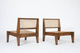 Image of Pierre Jeanneret, Pair of low chairs, c.1955-56 - 3/4 front and 3/4 back view