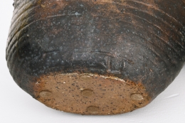 Rémi Bonhert's ceramic vase, detailed view of signature stamp on bottom
