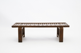 Jacques Adnet's coffee table/bench straight view