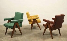 Three of Le Corbusier & Pierre Jeanneret's "Committee" armchair in green, yellow and red (left to right)
