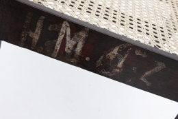 Pierre Jeanneret's set of 8 demountable chairs detailed view of marking on back of chair