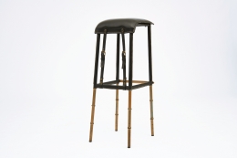 Jacques Adnet pair of bar stools side view