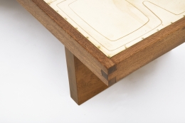 Jany Blazy's coffee table detail of metal top and wood frame