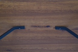 Marolles' dining table detailed view of signature underneath table top