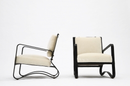 Jacques Adnet pair of armchairs side and front view