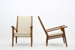 Jacques Adnet's pair of armchairs front and side views