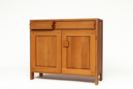 Pierre Chapo's "R07" sideboard, front diagonal view with one drawer slightly opened