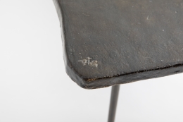 Annie Fourmanoir's ceramic coffee table, detailed view of signature on table top corner
