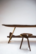 Michel Chauvet's stool installation view with Chauvet's "Poisson" sculptural desk behind