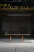 Pierre Chapo "T14C" dining table installation image in warehouse with "D08" extensions