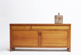 Pierre Chapo's "R08" sideboard straight view with ceramic vase on top