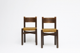 Charlotte Perriand's set of 6 "Meribel" chairs, front view of two
