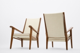 Jacques Adnet's pair of armchairs front and back views