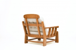 Maison Regain's pair of armchairs, back diagonal view of single armchair